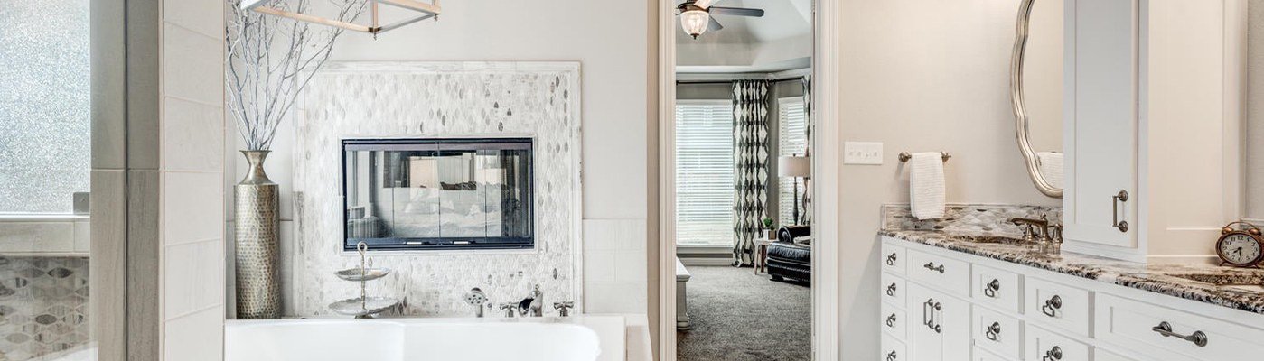 Beautiful tile flooring in ensuite bathroom and plush carpet in bedroom