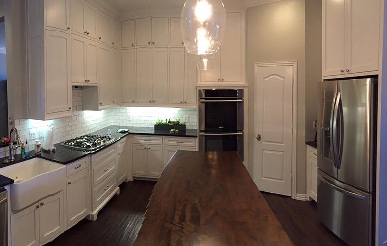Beautiful kitchen with dark flooring