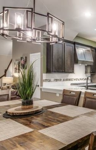 Beautifully appointed dining room and kitchen with new floors