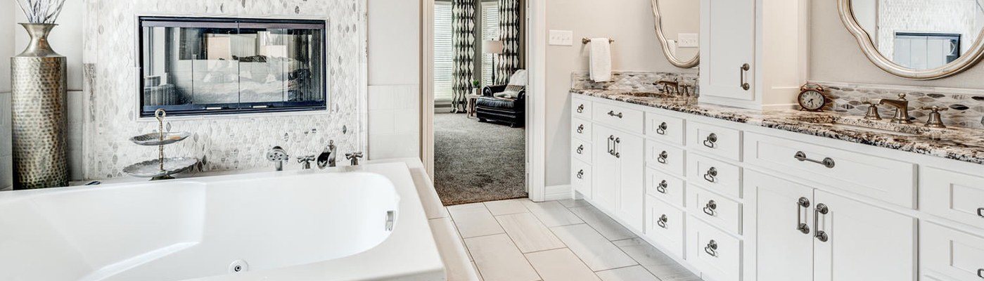 Natural stone flooring in en suite bathroom