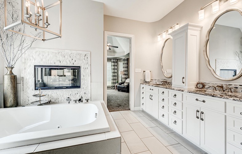 Large double vanity and deep bathtub in remodeled bathroom