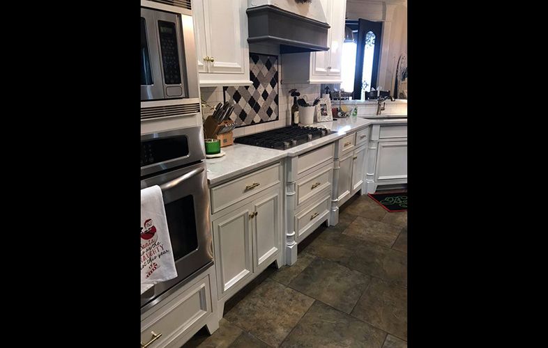 White cabinets in newly remodeled kitchen