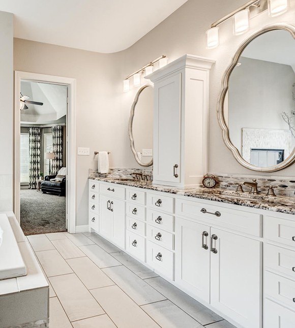 Custom tile flooring in en suite bathroom