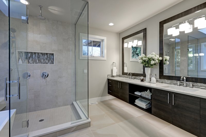 a large master bathroom, complete with tile floors