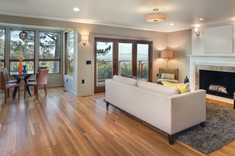 a nicely decorated living room with what appear to be wood floors