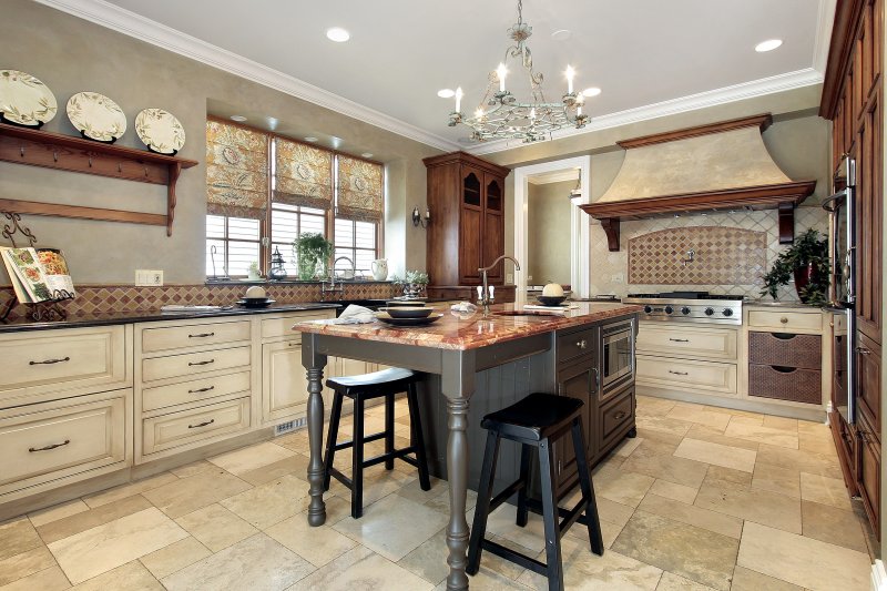 a kitchen with beautiful tiled floors 